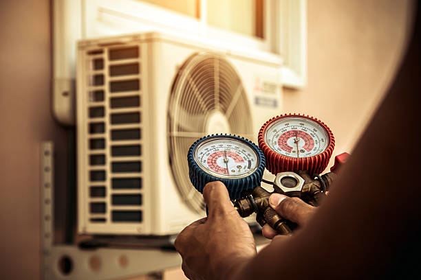 Professional Air Conditioning Service technician working in Cresskill, NJ
